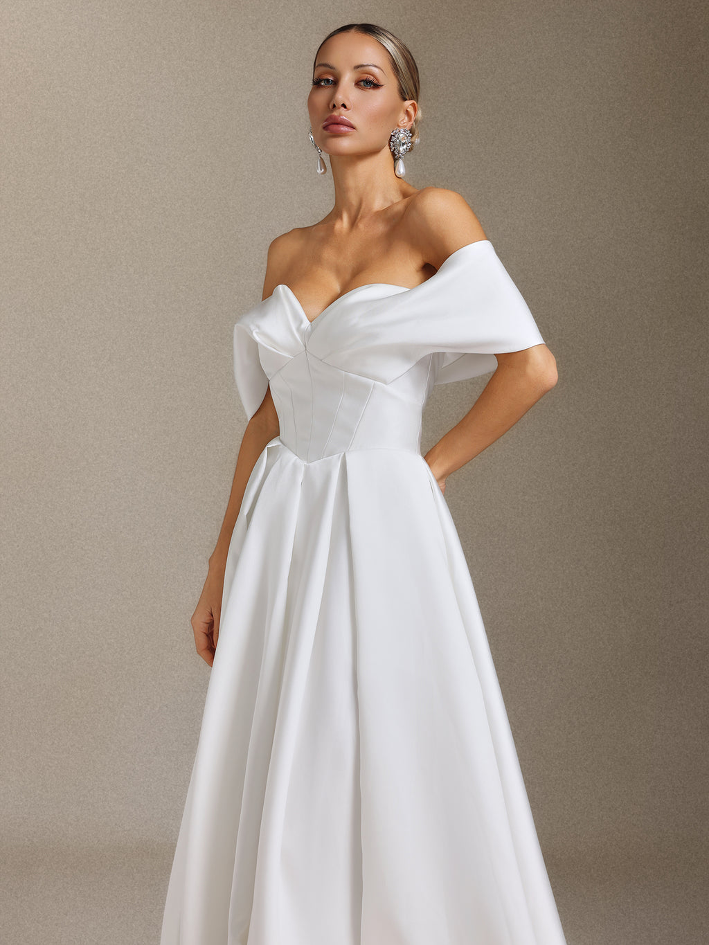 Molia Off-the-shoulder, pleated and tail-length wedding dress	